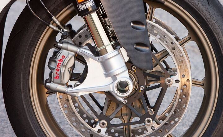 Plenty of lightweight moto jewelry abounds. Öhlins suspension is de rigueur on high-end Ducatis, but the Superleggera’s is super special. The fully adjustable FL916 fork with billet-aluminum bottoms and anti-stiction titanium-nitride coating is said to be 3 lbs(!) lighter than the R’s. Out back, the Öhlins TTX36 shock is fitted with a titanium spring to further shave weight. Wheels are forged from ultra-light magnesium. Brembo M50 calipers offer unrivaled strength and feedback.