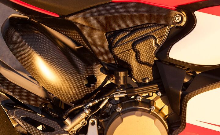 Carbon fiber is prominently featured on the Superleggera, seen here in heat shielding for the rear cylinder and its header, footrest heelguard and fairing panels. The carbon rear subframe supports the seat and tail structure while weighing just 2 lbs.
